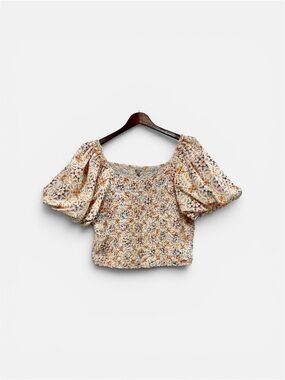 Anthropologie Dolan crop top in a multicolor floral print.